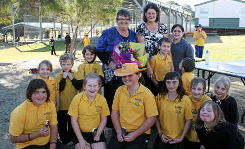 Glennie Heights students present principal Robyn Cummings with a bunch of flowers. Photo: Kerri Burns-Taylor Glennie Heights students present principal Robyn Cummings with a bunch of flowers. Photo: Kerri Burns-Taylor